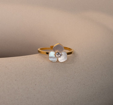 Opalescent shell petal ring